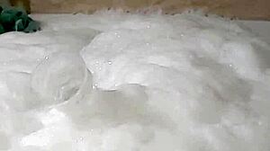 Cyno enjoys a suggestive bubble bath in cosplay costume