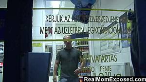 Blonde milf pays cashier with blowjob in store