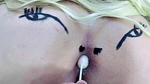 Pink asshole sucks lollipop in sheer red