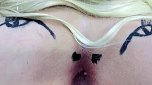 Pink asshole sucks lollipop in sheer red