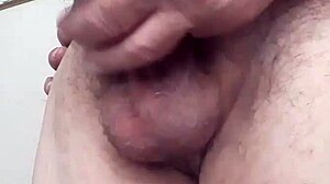 Fat guy jerks off his monster cock intensely