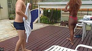 brunette in pool does mouth and pussy