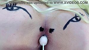 Pink asshole sucks lollipop in sheer red