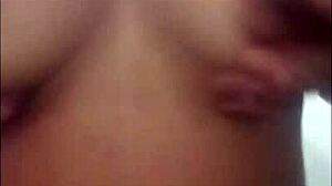 Pregnant latina masturbates while watching voyeur cum on her big tits.