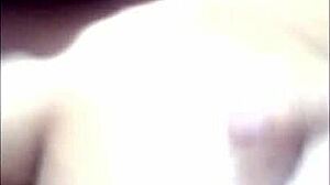 Pregnant latina masturbates while watching voyeur cum on her big tits.