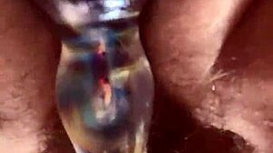 I masturbate with glass dildo on my hairy pussy close up