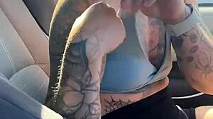 Just a girl trying to fix her sports bra in the gym parking lot