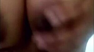 Pregnant latina masturbates while watching voyeur cum on her big tits.