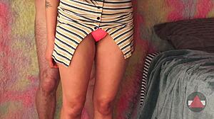 Lifting Her Skirt To Reveal Thighs In A Playful Moment