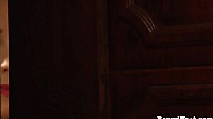 lesbian slave and dominant madame making love on the bed