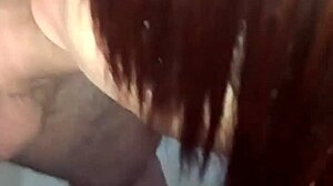 Transsexual sucks young client's pink dick in apartment for sensual encounter.