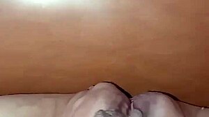 Dialogic: Gretala, tutta nuda incinta, exposes her big natural tits and pregnant belly for fetish flashing.