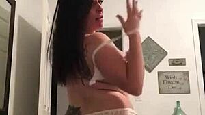 tattooed milf with big tits does a homemade striptease, ripping clothes off