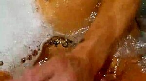 Watch this horny couple masturbate together. Wife's tits and cum in homemade video.