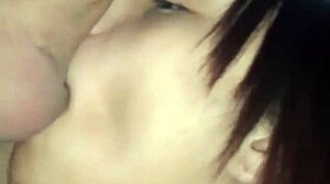 Transsexual sucks young client's pink dick in apartment for sensual encounter.