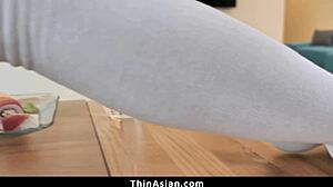 Tiny Asian slut gets pounded by big cock and squirts everywhere