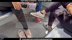 Taking off sweaty shoes and socks on the cableway in Medellin