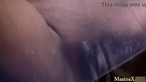 Mature pornstar Maxine X plays with her wet pussy and big tits in lingerie.