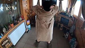 cheating wife dances playfully with husband's friend while he's away