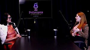 Redhead beauty interviewed by presenter Bia Hot, then poses on sheer red - Natasha Fiore