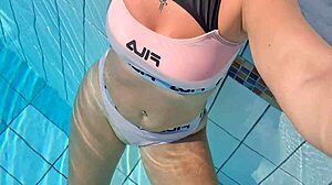 Blonde Plays with Wet Pussy in Public Pool