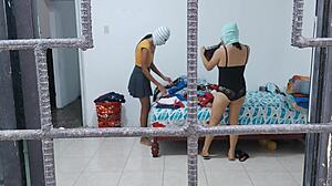 Horny housewives touch buttocks and tits while doing housework.