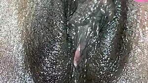 She masturbates in close-up.