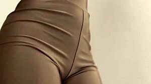 Beautiful Brazilian wife tries on clothes in the dressing room