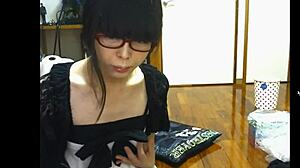 Japanese SHEMALE engages in solo MASTURBATION session.