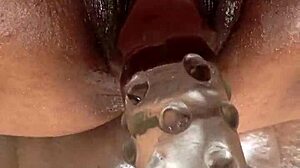 massive black pussy gets huge dildo insertion and clit stimulation in intense solo masturbation session