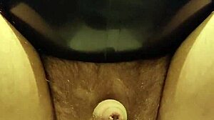 Latexi69 teases with butt plug in anal play using latex gear