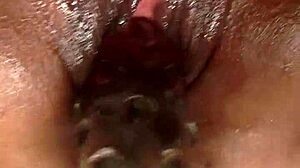 massive black pussy gets huge dildo insertion and clit stimulation in intense solo masturbation session