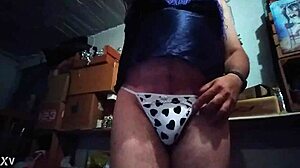Descriptive transsexual flaunts sexy ass in tight thong