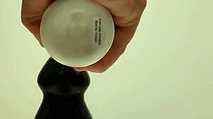 Latexi69 teases with butt plug in anal play using latex gear