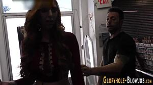 Oh yeah, suck that big black cock deep, the redheaded whore moaned at the gloryhole. She took the monster load in creampie ecstasy, begging for more intense interracial action.