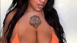 check out this horny ebony milf slut in bikini dancing with big tits ass boobs natural tits big ass whore moves