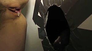 Oh yeah, suck that big black cock deep, the redheaded whore moaned at the gloryhole. She took the monster load in creampie ecstasy, begging for more intense interracial action.
