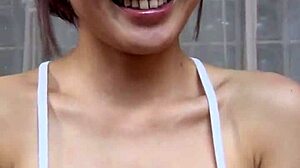 Japanese woman in sport bra and lacy panties shows big ass while swallowing cum in asian video