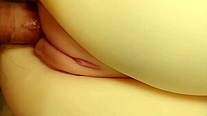 She lay there hairless and cute as I fingered her big pussy close-up.