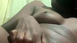 Black babe controls her pretty young pussy alone