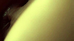 My wife fingers her cute shaved wet pussy in a solo masturbation session. I captured every beautiful detail on film.