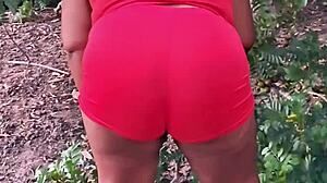 Vizinha evangélica pegando frutas in a casual outdoor moment with curvy ebony wife showing off her big natural tits