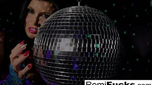 romi plays with a disco ball before stuffing and toying her pussy