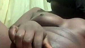 Black babe controls her pretty young pussy alone