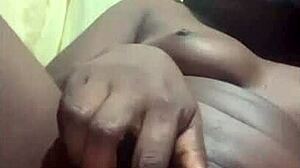 Black babe controls her pretty young pussy alone