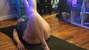 Hey, check out this hot milf stretching her big ass in early morning yoga session.