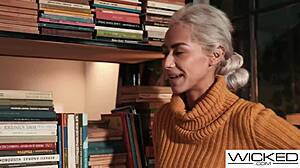 Super hot blonde model strips down during photoshoot. She bends over for doggystyle fuck.