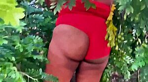 Vizinha evangélica pegando frutas in a casual outdoor moment with curvy ebony wife showing off her big natural tits