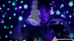 i love samantha saint's big tits in this black light lesbian scene
