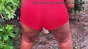 Vizinha evangélica pegando frutas in a casual outdoor moment with curvy ebony wife showing off her big natural tits